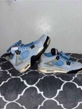 Jordan Air Jordan 4 'University Blue' Light Blue Suede Sneakers